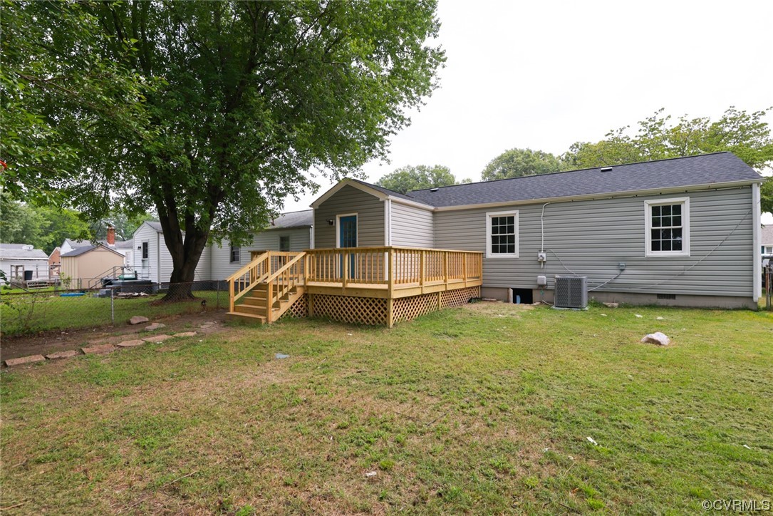 524 Chestnut Avenue Colonial Heights, VA 23834 - Photo 11 of 44 a view of a house with a yard and a large tree