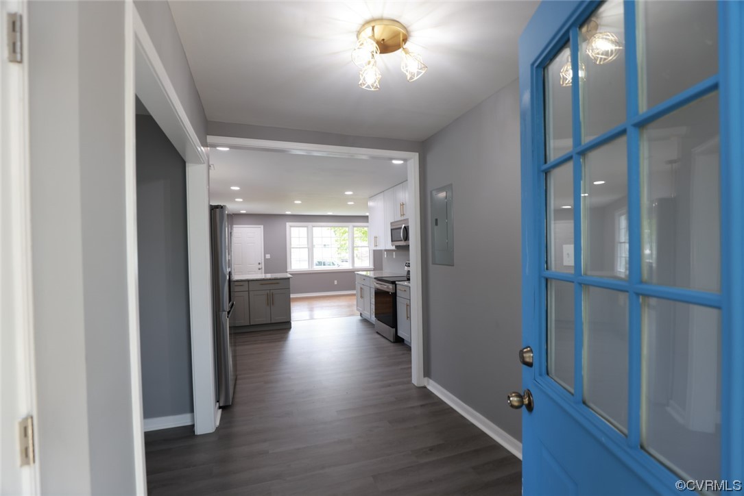 524 Chestnut Avenue Colonial Heights, VA 23834 - Photo 18 of 44 a view of a hallway with wooden floor windows and livingroom