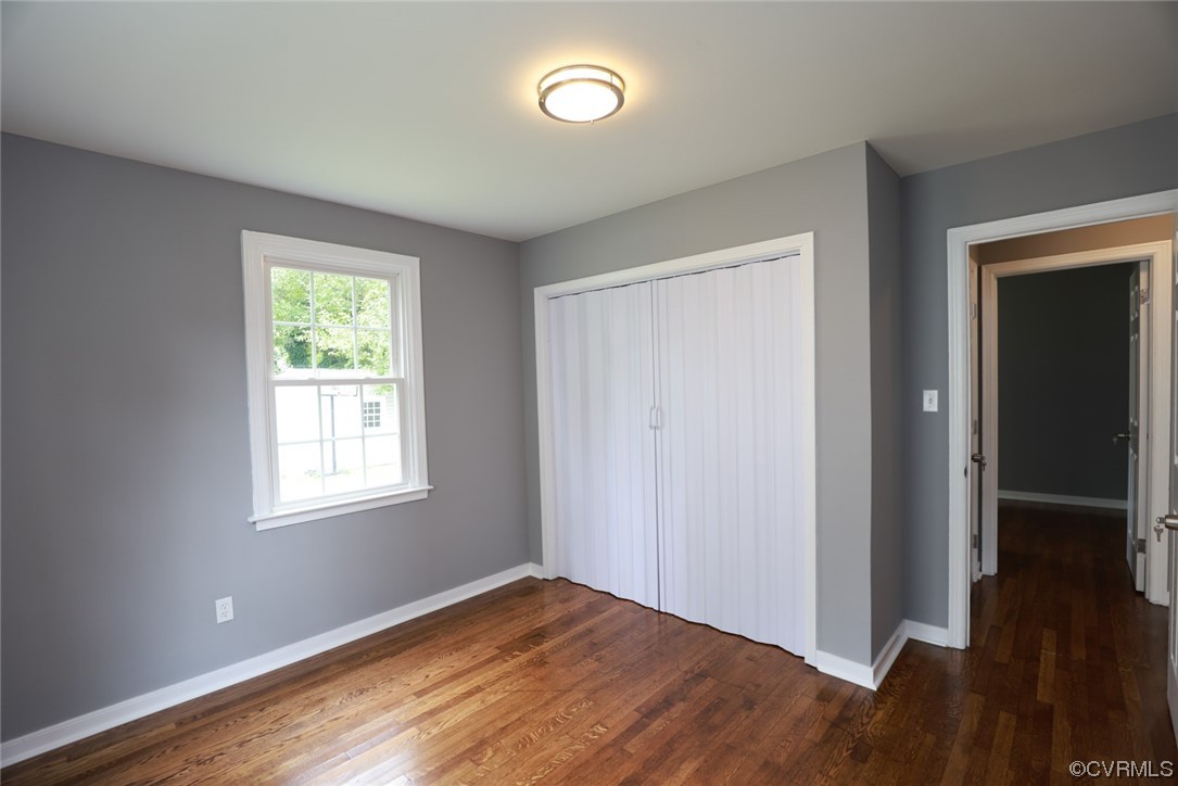 524 Chestnut Avenue Colonial Heights, VA 23834 - Photo 23 of 44 a view of an empty room with wooden floor and a window