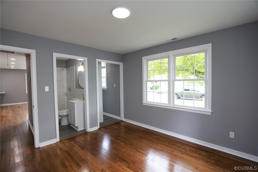 524 Chestnut Avenue Colonial Heights, VA 23834 - Photo 29 of 44 a view of an empty room with wooden floor and a window