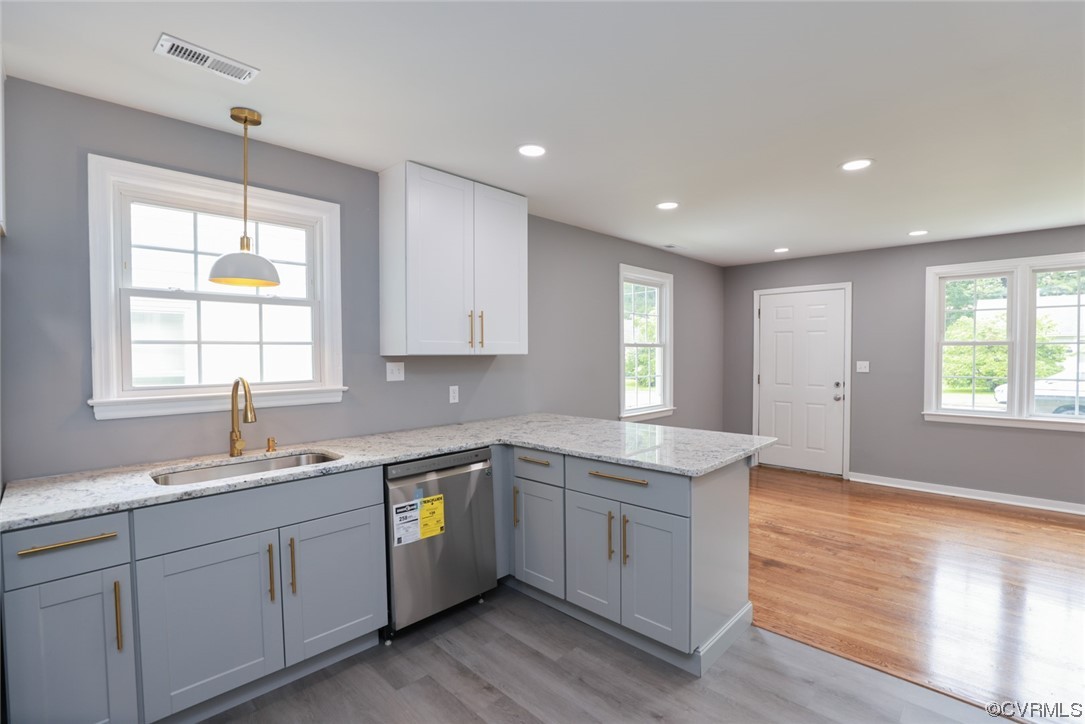 524 Chestnut Avenue Colonial Heights, VA 23834 - Photo 31 of 44 a kitchen with a sink window and cabinets