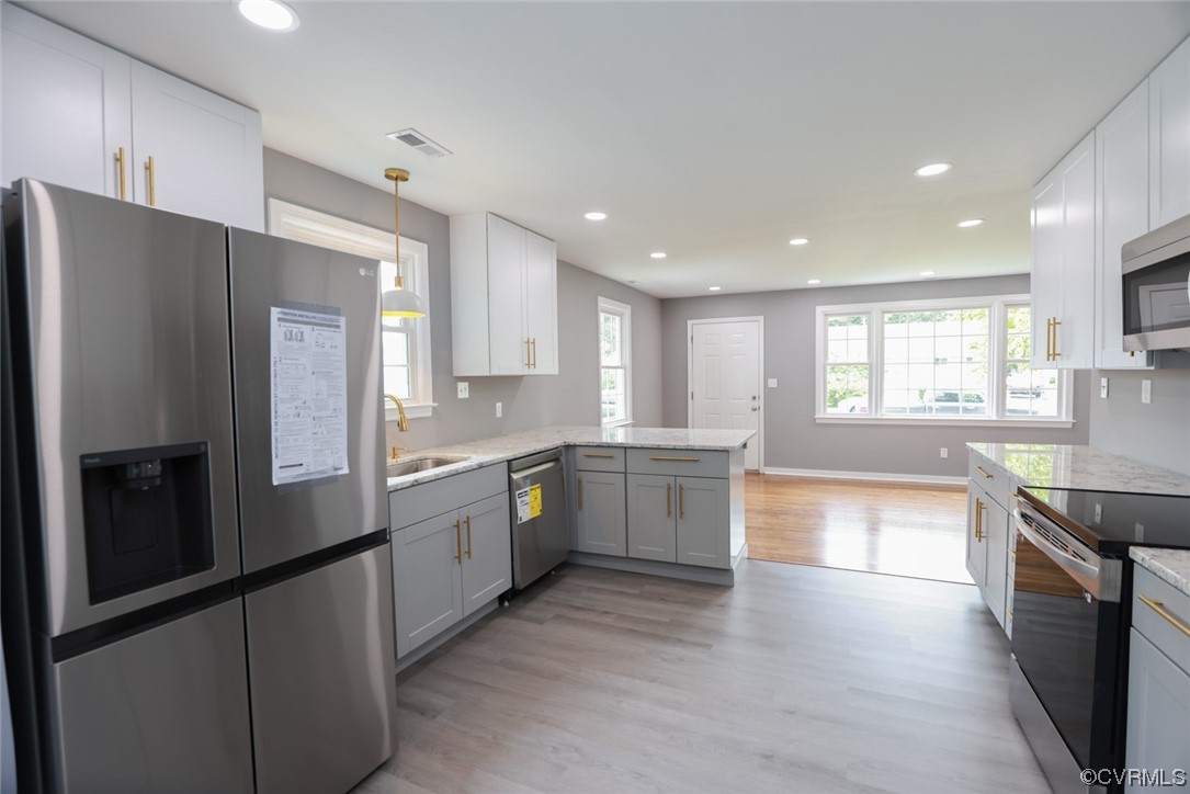 524 Chestnut Avenue Colonial Heights, VA 23834 - Photo 36 of 44 a large kitchen with a large window and stainless steel appliances
