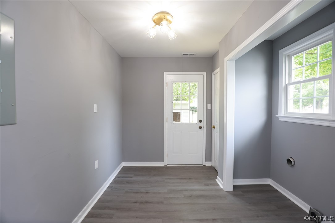 524 Chestnut Avenue Colonial Heights, VA 23834 - Photo 37 of 44 an empty room with wooden floor and windows
