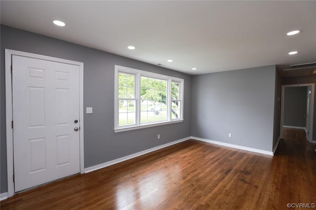 524 Chestnut Avenue Colonial Heights, VA 23834 - Photo 38 of 44 an empty room with wooden floor and windows