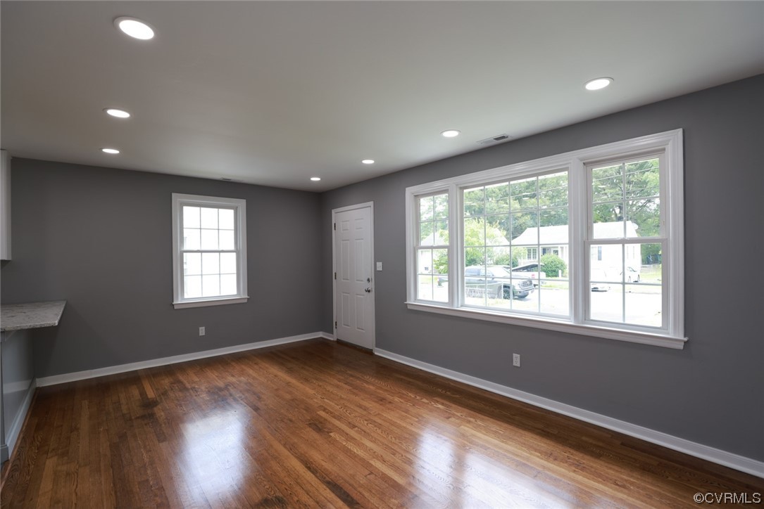 524 Chestnut Avenue Colonial Heights, VA 23834 - Photo 39 of 44 a view of an empty room with wooden floor and a window