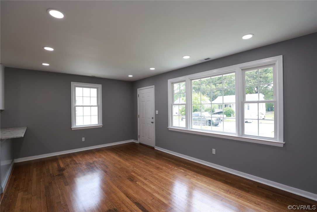 524 Chestnut Avenue Colonial Heights, VA 23834 - Photo 40 of 44 a view of an empty room with wooden floor and a window