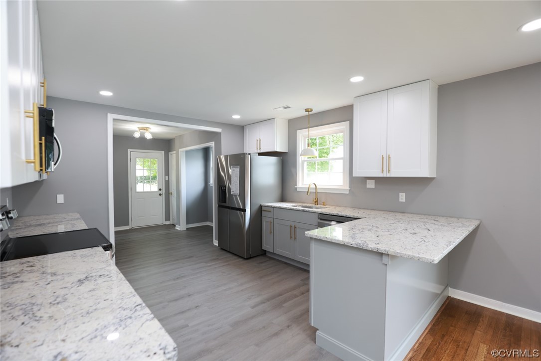 524 Chestnut Avenue Colonial Heights, VA 23834 - Photo 5 of 44 a kitchen with a refrigerator sink and cabinets