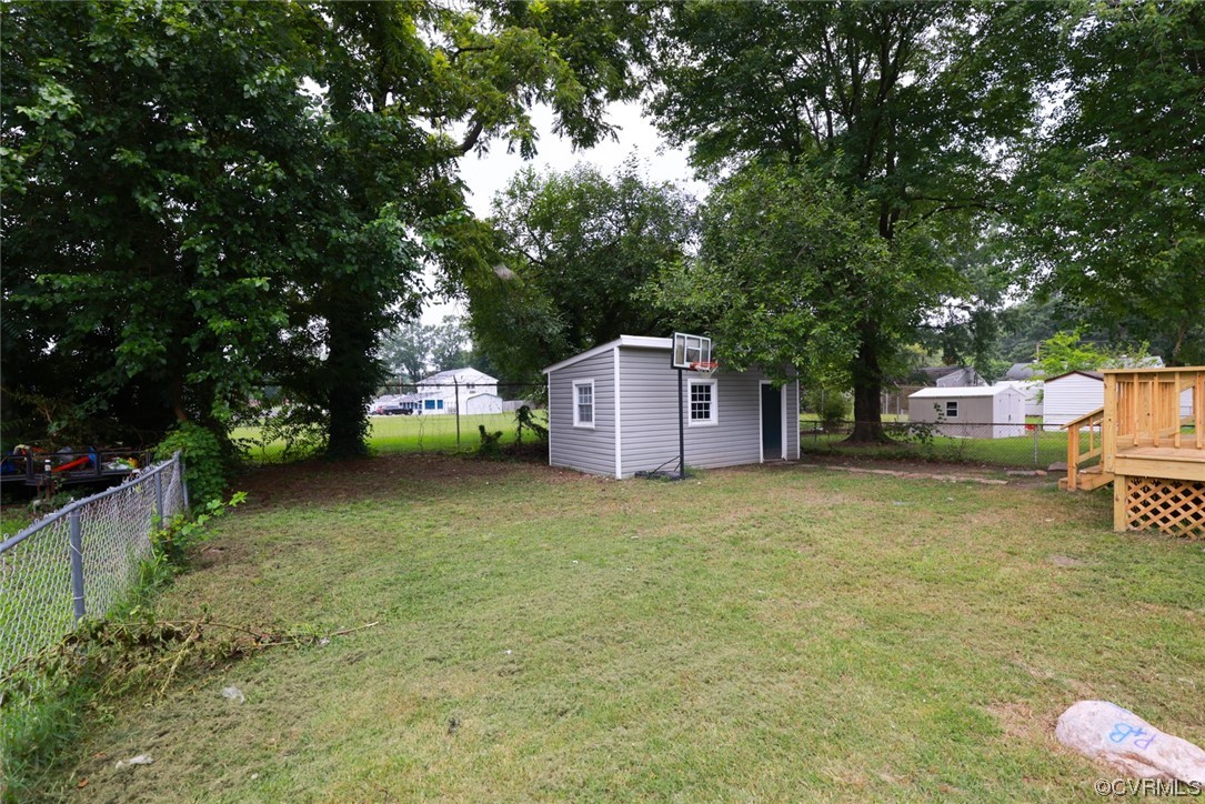 524 Chestnut Avenue Colonial Heights, VA 23834 - Photo 9 of 44 a house is sitting in middle of forest