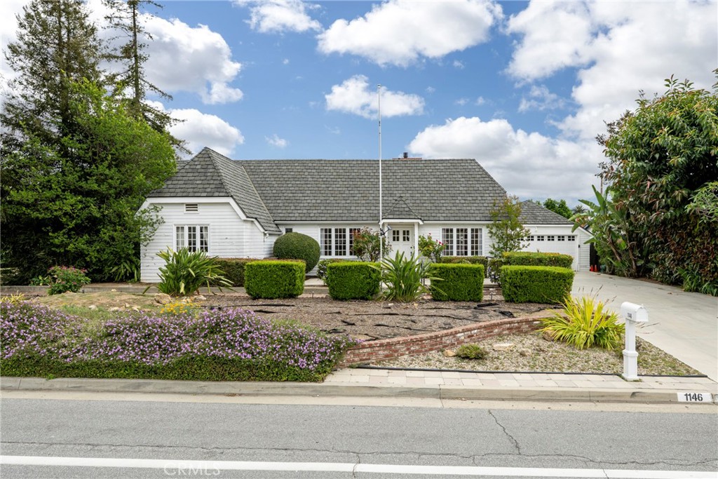 1146 North Puente Street Brea, CA 92821 - Photo 1 of 36 a front view of a house with a yard