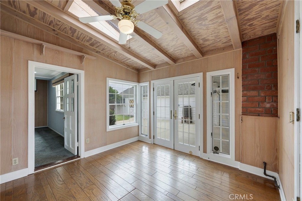 1146 North Puente Street Brea, CA 92821 - Photo 11 of 36 a view of a hallway with wooden floor
