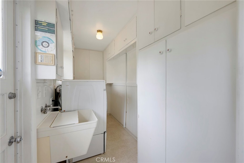 1146 North Puente Street Brea, CA 92821 - Photo 13 of 36 a bathroom with a bathtub sink and toilet