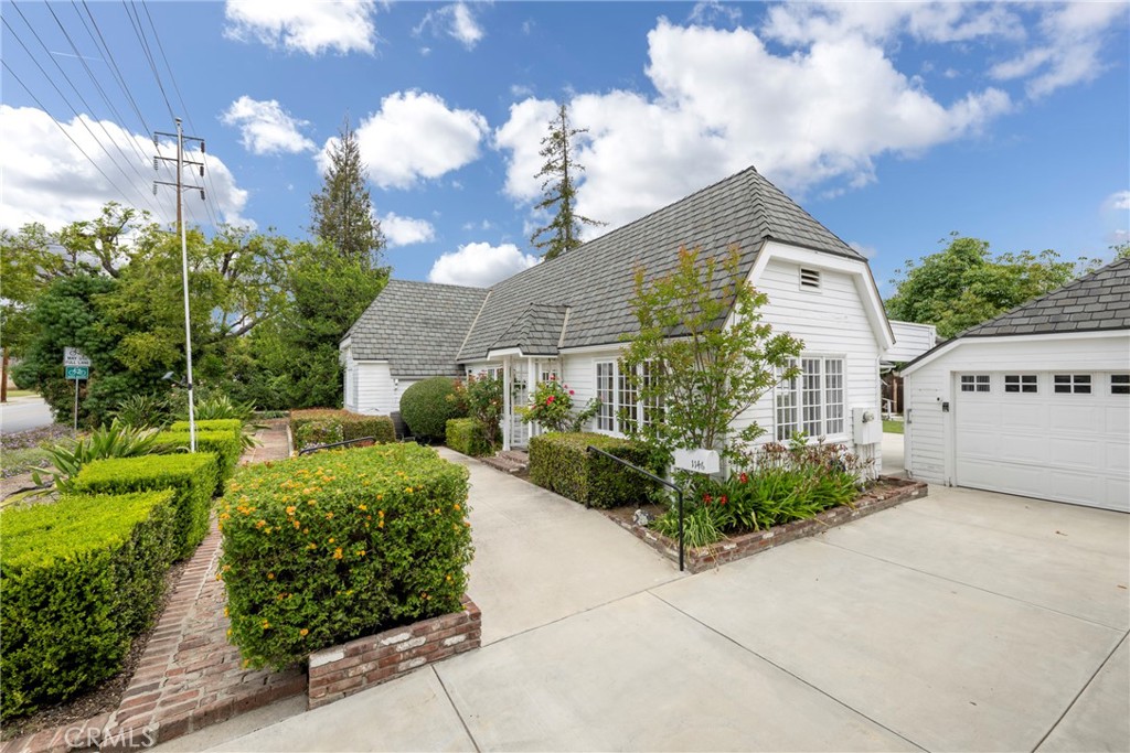 1146 North Puente Street Brea, CA 92821 - Photo 3 of 36 a front view of a house with garden
