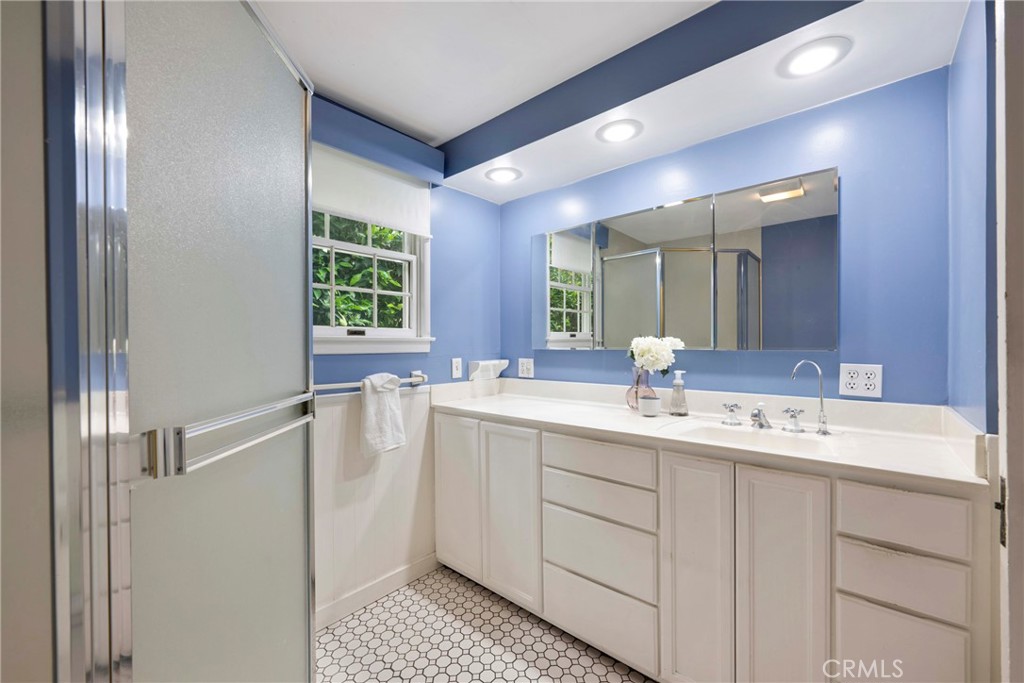 1146 North Puente Street Brea, CA 92821 - Photo 9 of 36 a view of bathroom with a sink mirror and a window