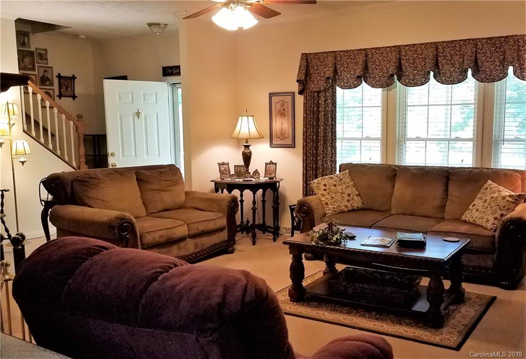732 Lookout Tower Road Blacksburg, SC 29702 - Photo 8 of 31 a living room with furniture and a large window