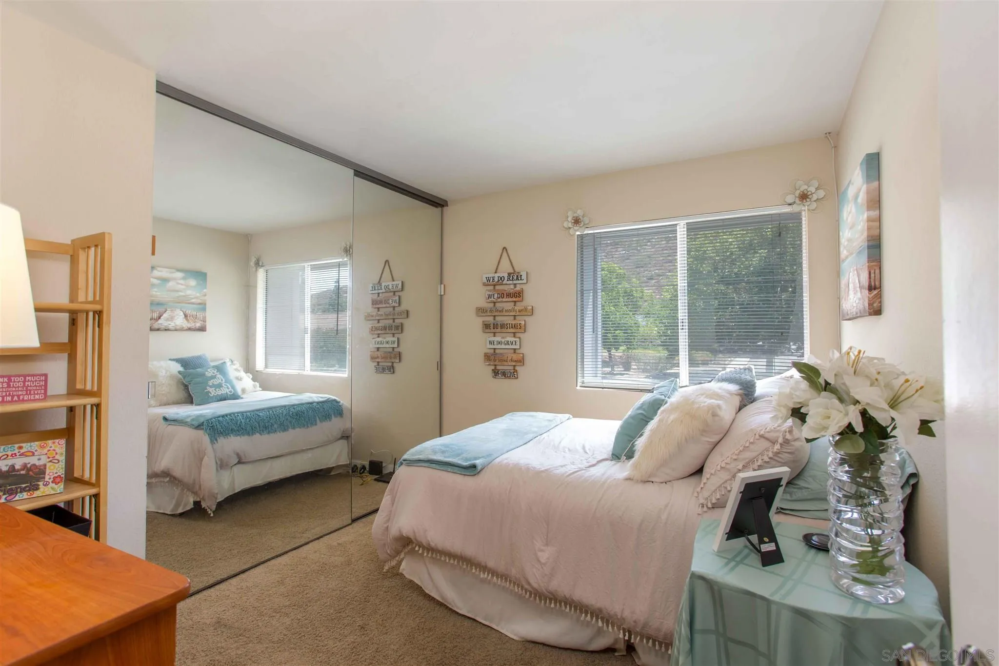 10384 Alphonse Street, Unit E6 Santee, CA 92071 - Photo 16 of 26 a bedroom with a bed and a window