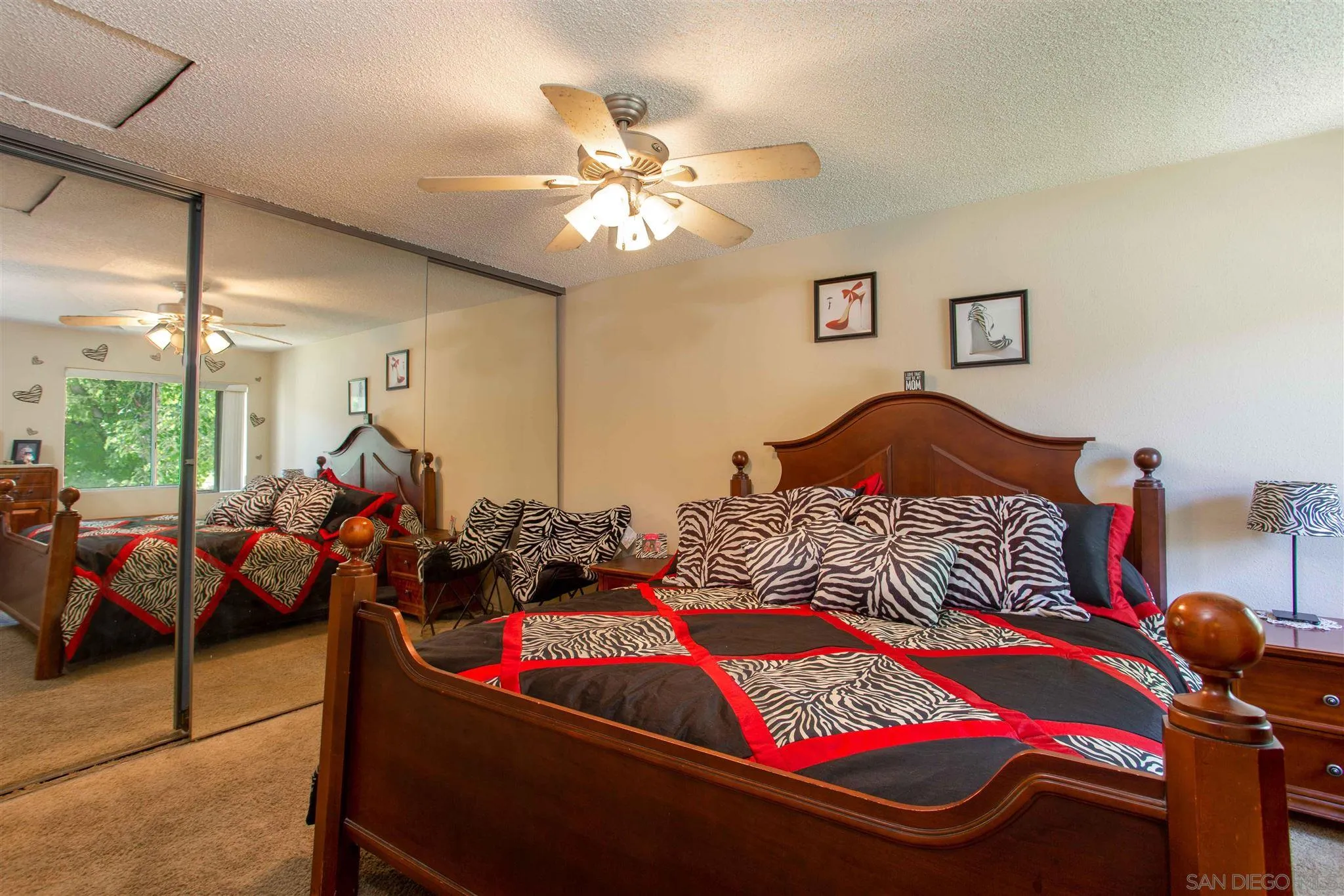 10384 Alphonse Street, Unit E6 Santee, CA 92071 - Photo 18 of 26 a bedroom with bed and window