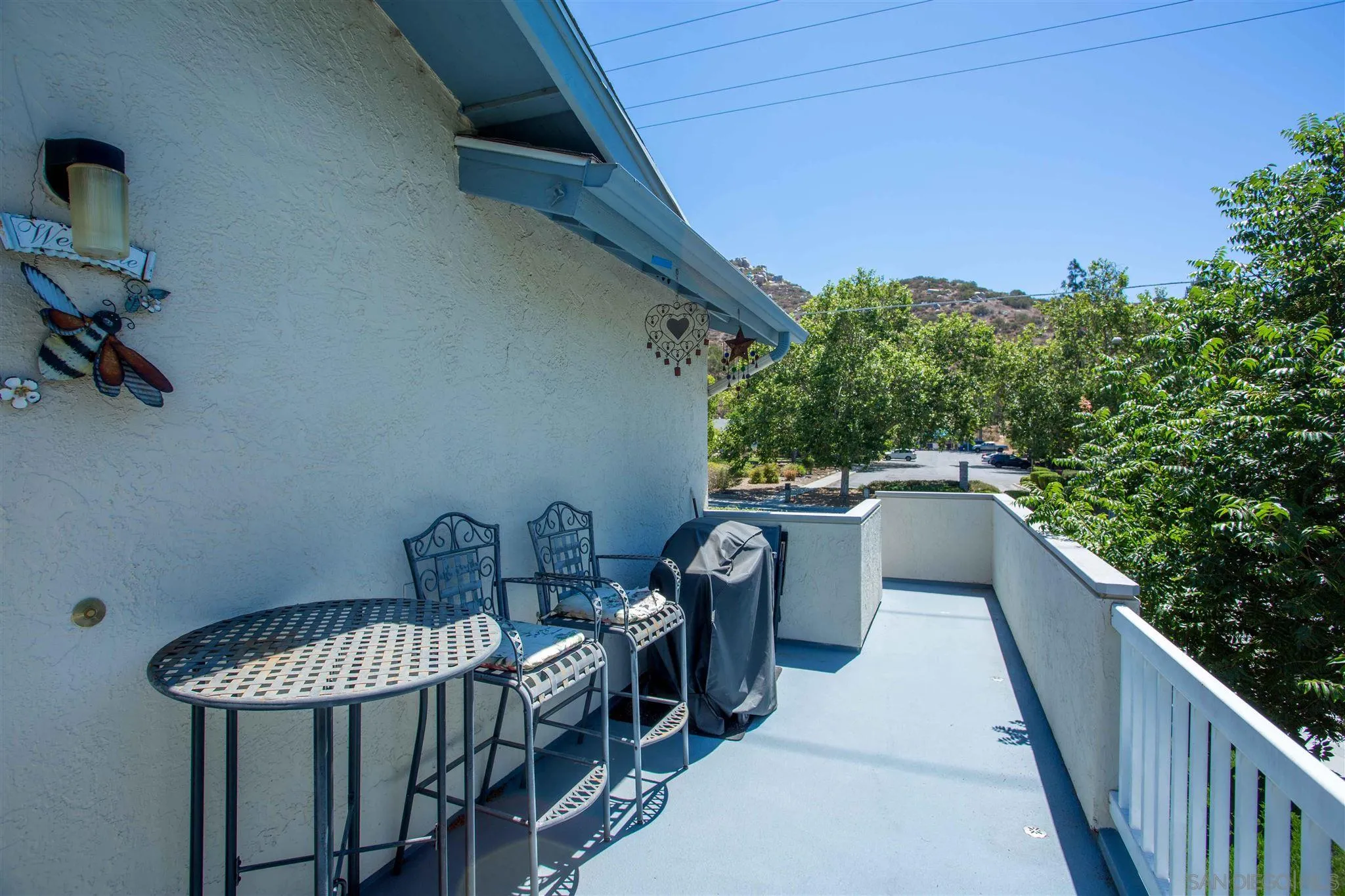 10384 Alphonse Street, Unit E6 Santee, CA 92071 - Photo 3 of 26 a balcony view with a seating space