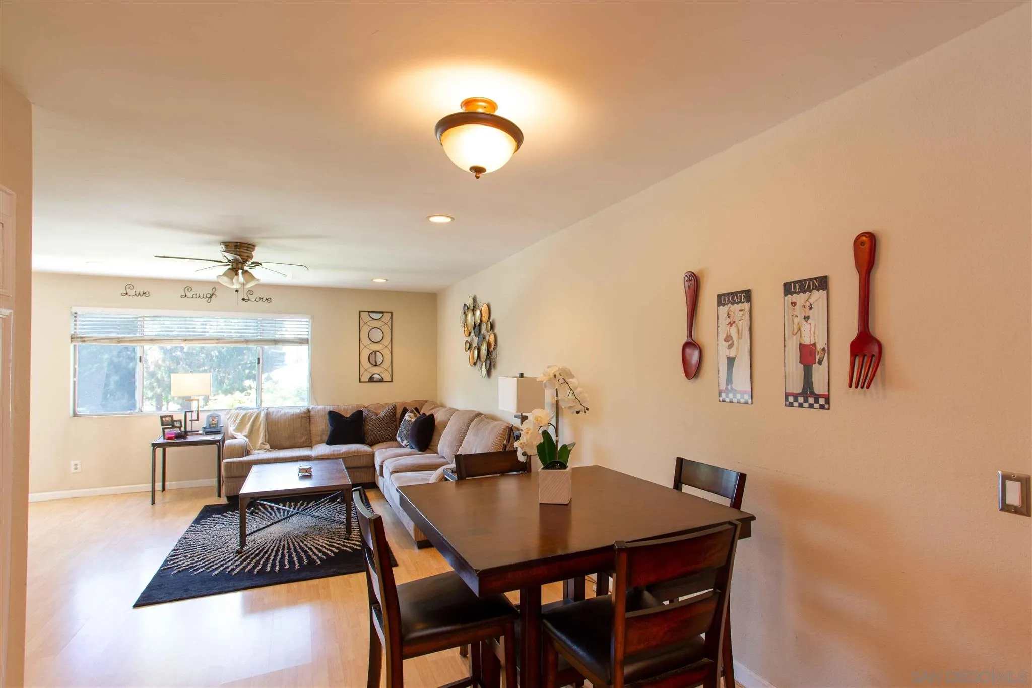 10384 Alphonse Street, Unit E6 Santee, CA 92071 - Photo 7 of 26 a view of a dining room with furniture