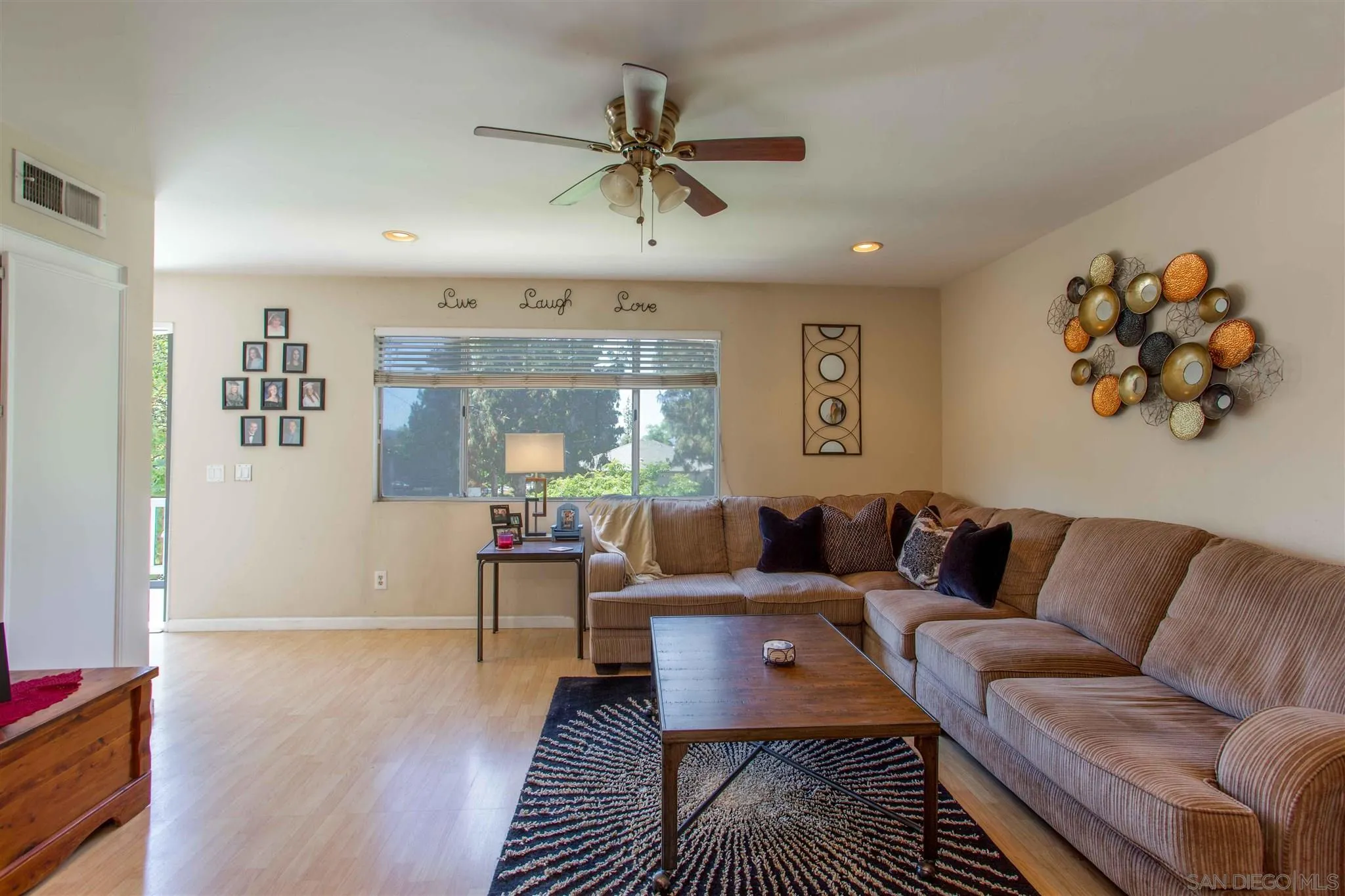 10384 Alphonse Street, Unit E6 Santee, CA 92071 - Photo 8 of 26 a living room with furniture