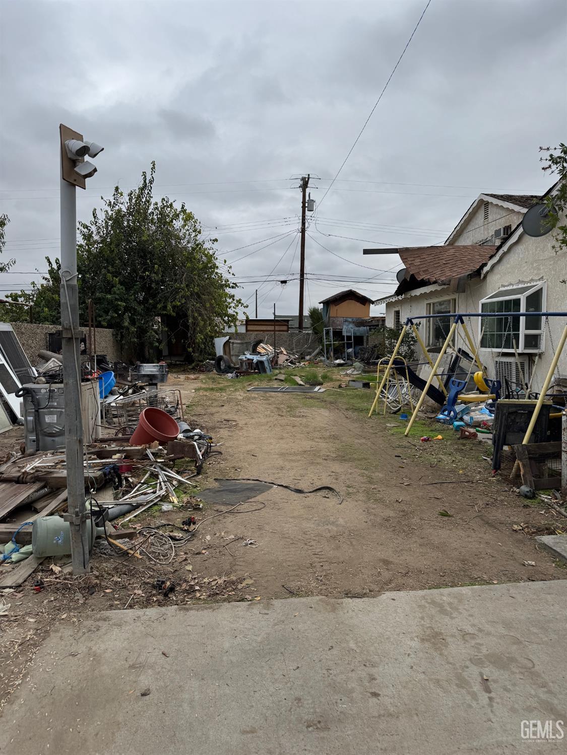 Undisclosed Address Bakersfield, CA 93307 - Photo 9 of 10 a view of a room with gym equipment