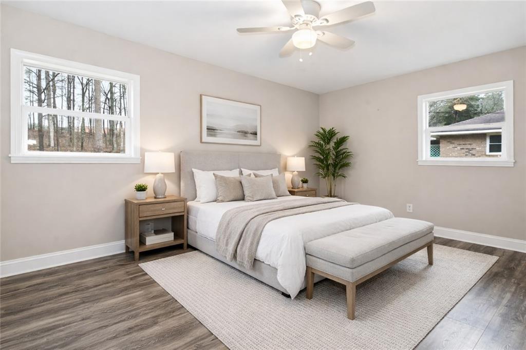 4319 Tradition Terrace Austell, GA 30106 - Photo 20 of 46 a bedroom with a bed and a painting on the wall