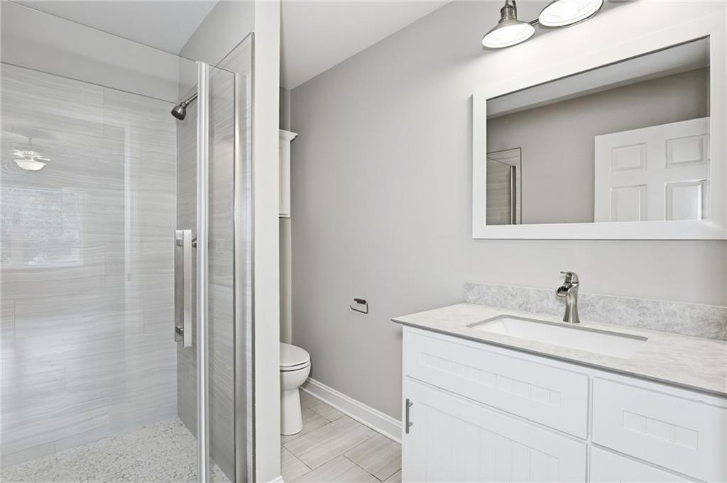 4319 Tradition Terrace Austell, GA 30106 - Photo 22 of 46 a bathroom with a sink and a mirror