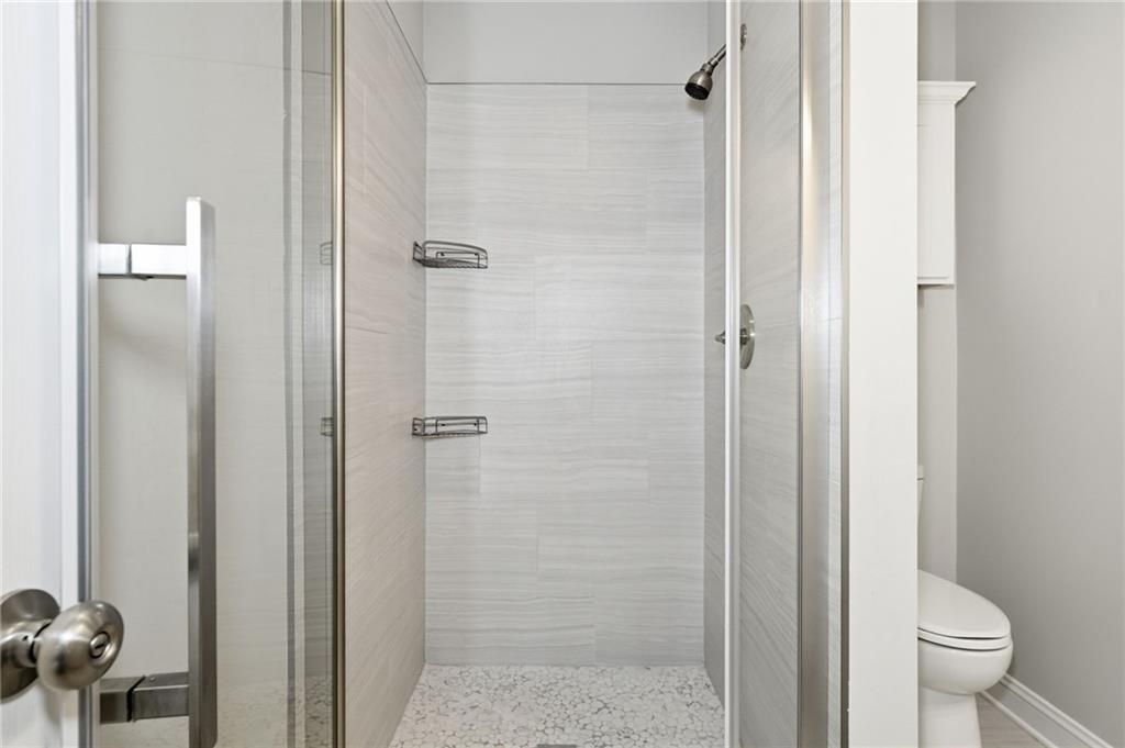 4319 Tradition Terrace Austell, GA 30106 - Photo 23 of 46 a bathroom with a shower