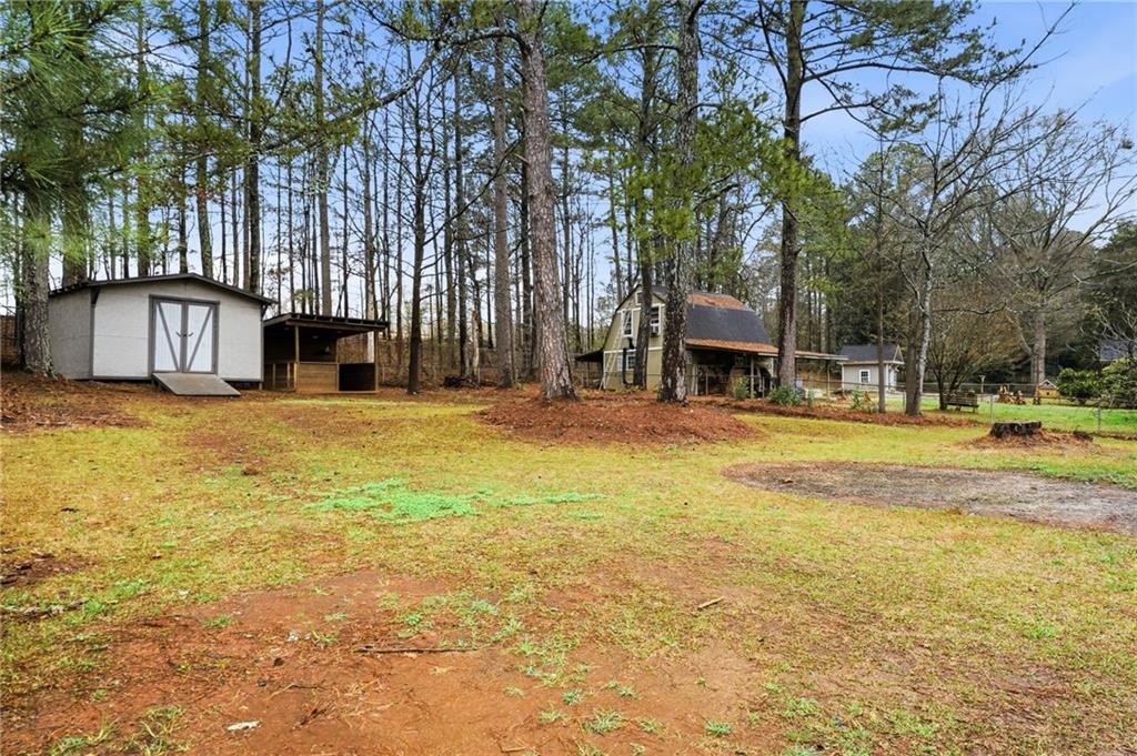 4319 Tradition Terrace Austell, GA 30106 - Photo 37 of 46 a view of a house with swimming pool and tree s
