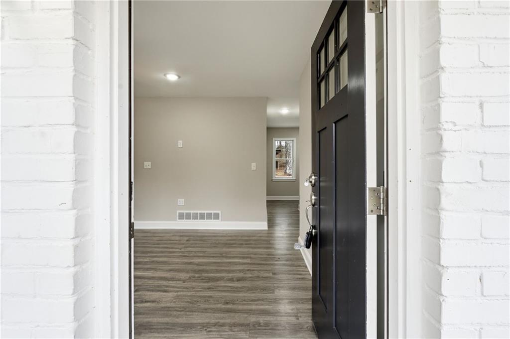 4319 Tradition Terrace Austell, GA 30106 - Photo 5 of 46 a view of a hallway with wooden floor
