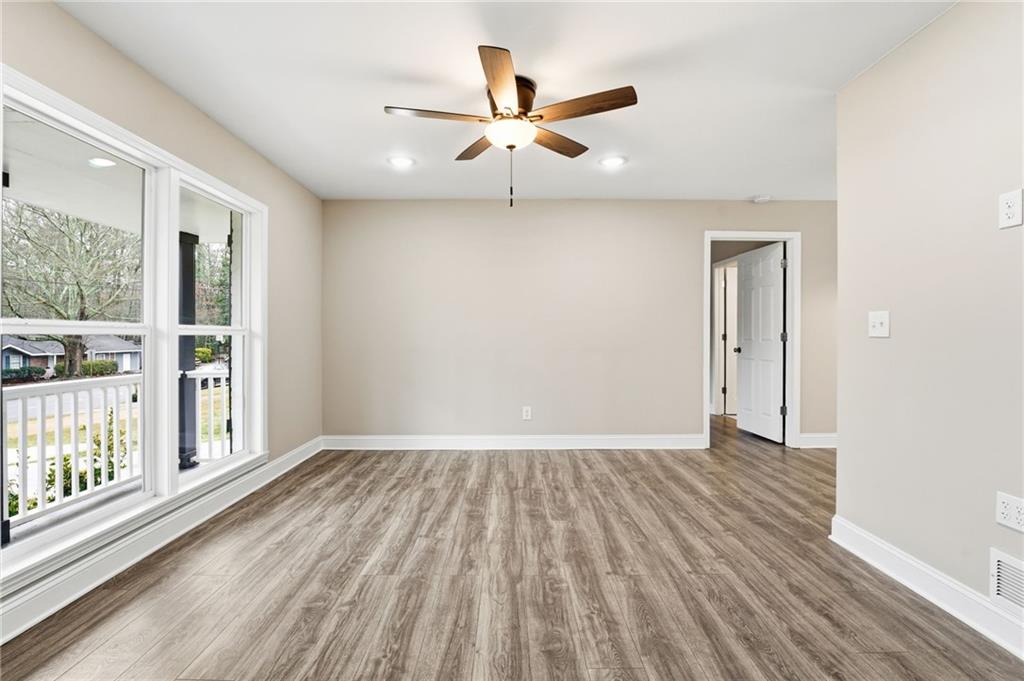 4319 Tradition Terrace Austell, GA 30106 - Photo 8 of 46 wooden floor in an empty room with a window