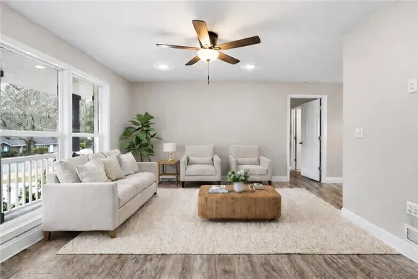 a living room with furniture and window