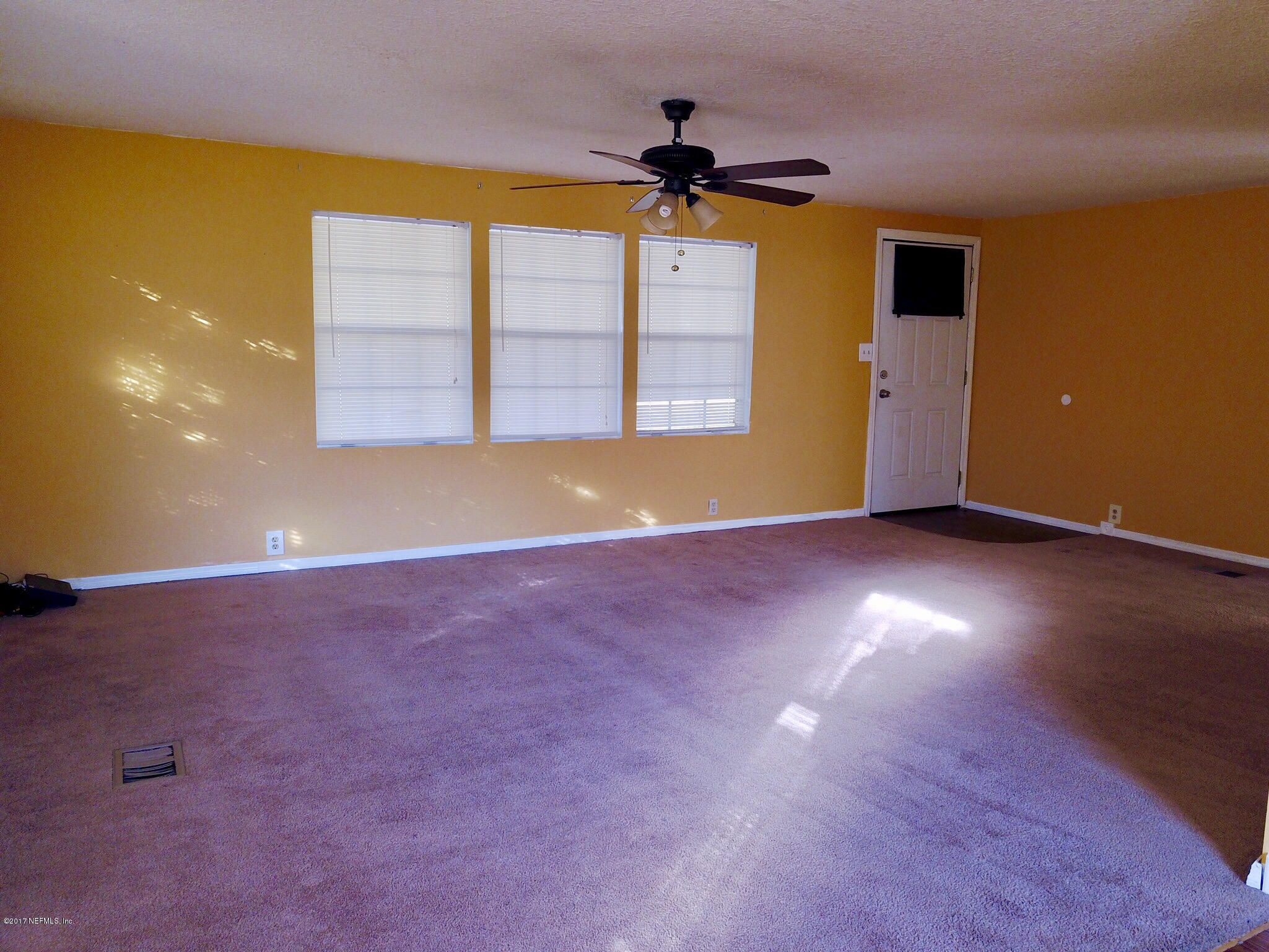 54082 Marlee Road Callahan, FL 32011 - Photo 4 of 13 a view of an empty room with a window