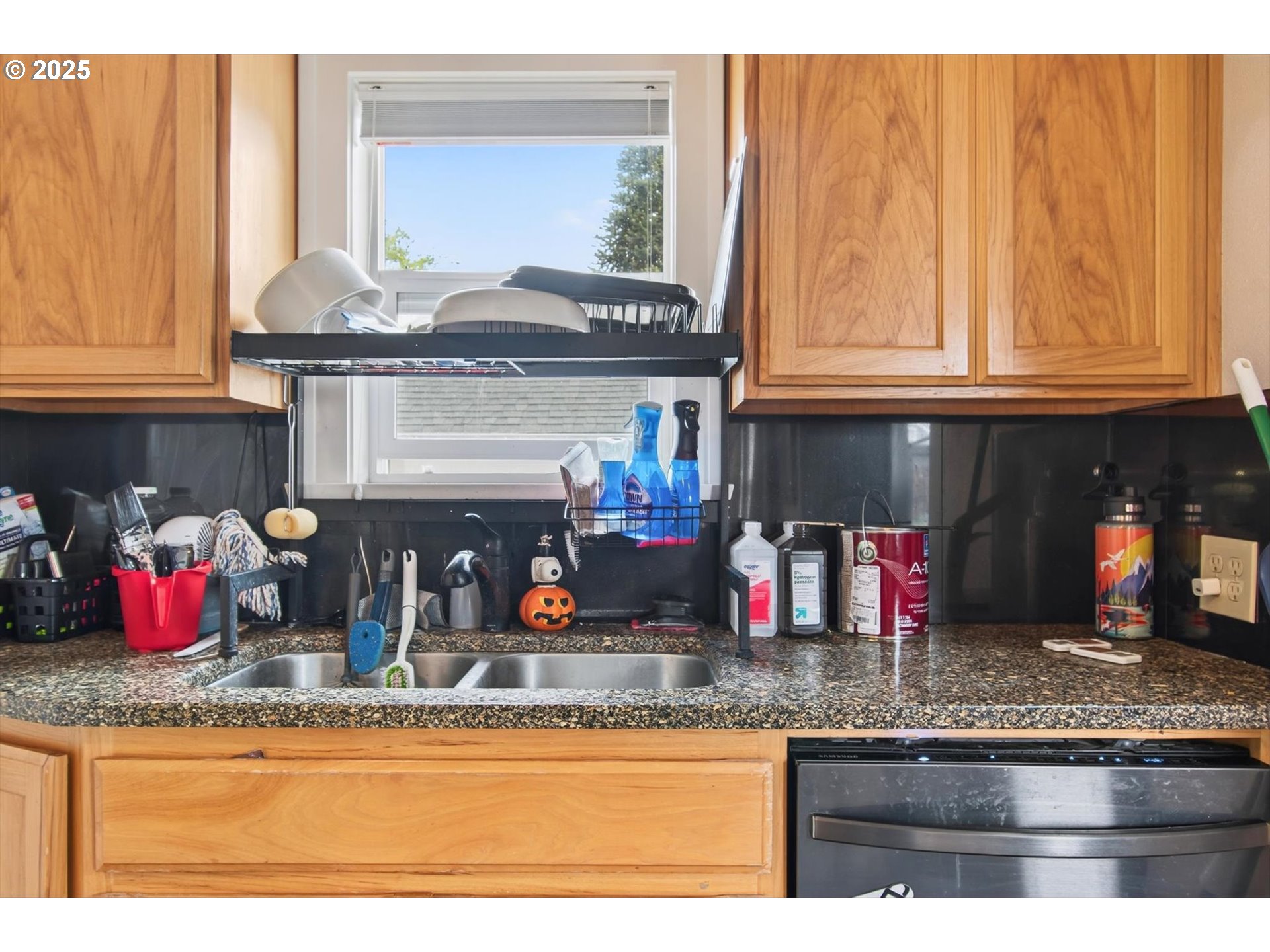 1202 3rd Avenue South Kelso, WA 98626 - Photo 20 of 28 a kitchen with granite countertop a sink and cabinets