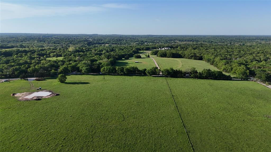 2 Dripping Springs Road Denison, TX 75021 - Photo 4 of 22 a view of a golf course with a lake