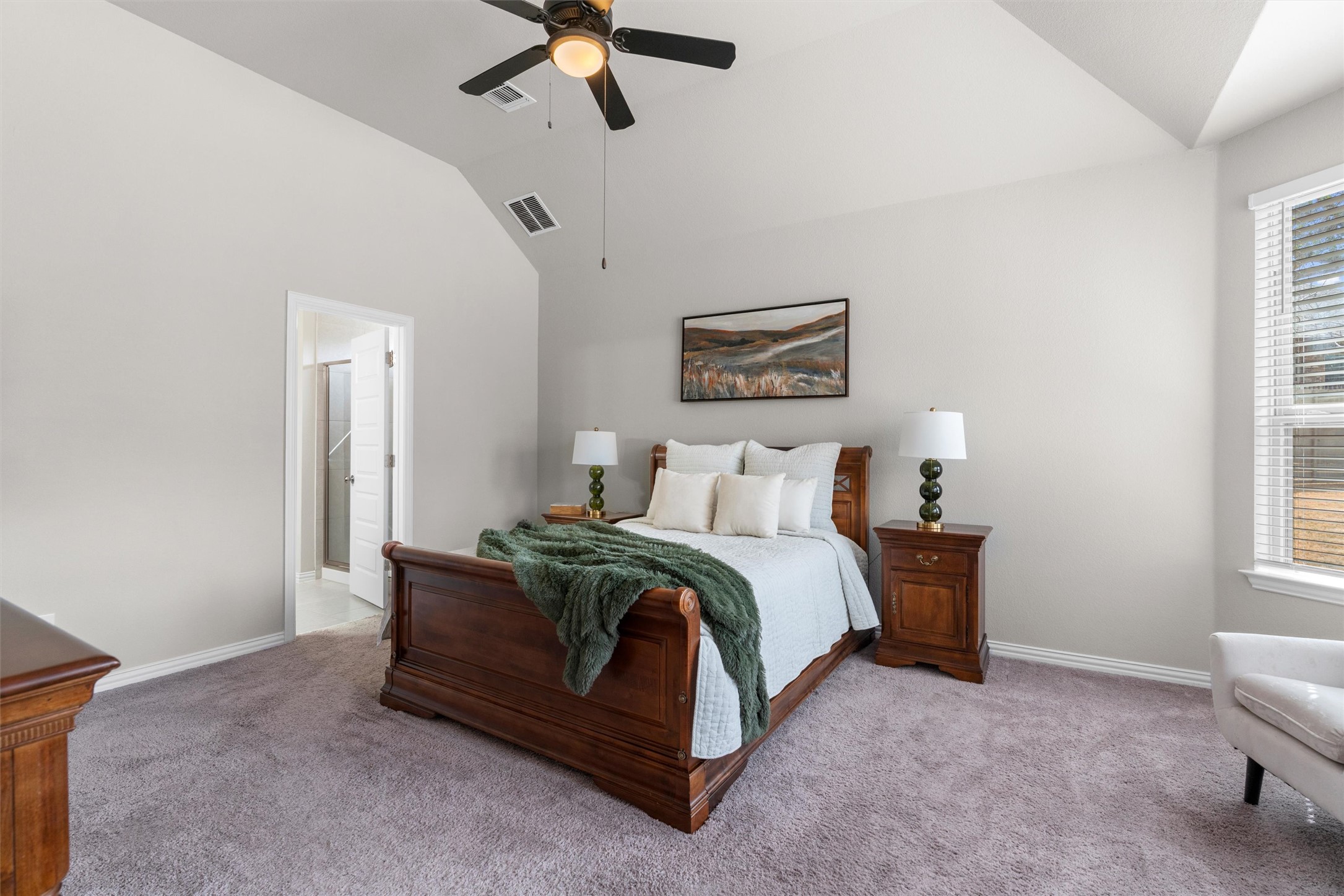 4216 Mercer Road Georgetown, TX 78628 - Photo 12 of 40 Bedroom featuring vaulted ceiling, carpet flooring, and ceiling fan