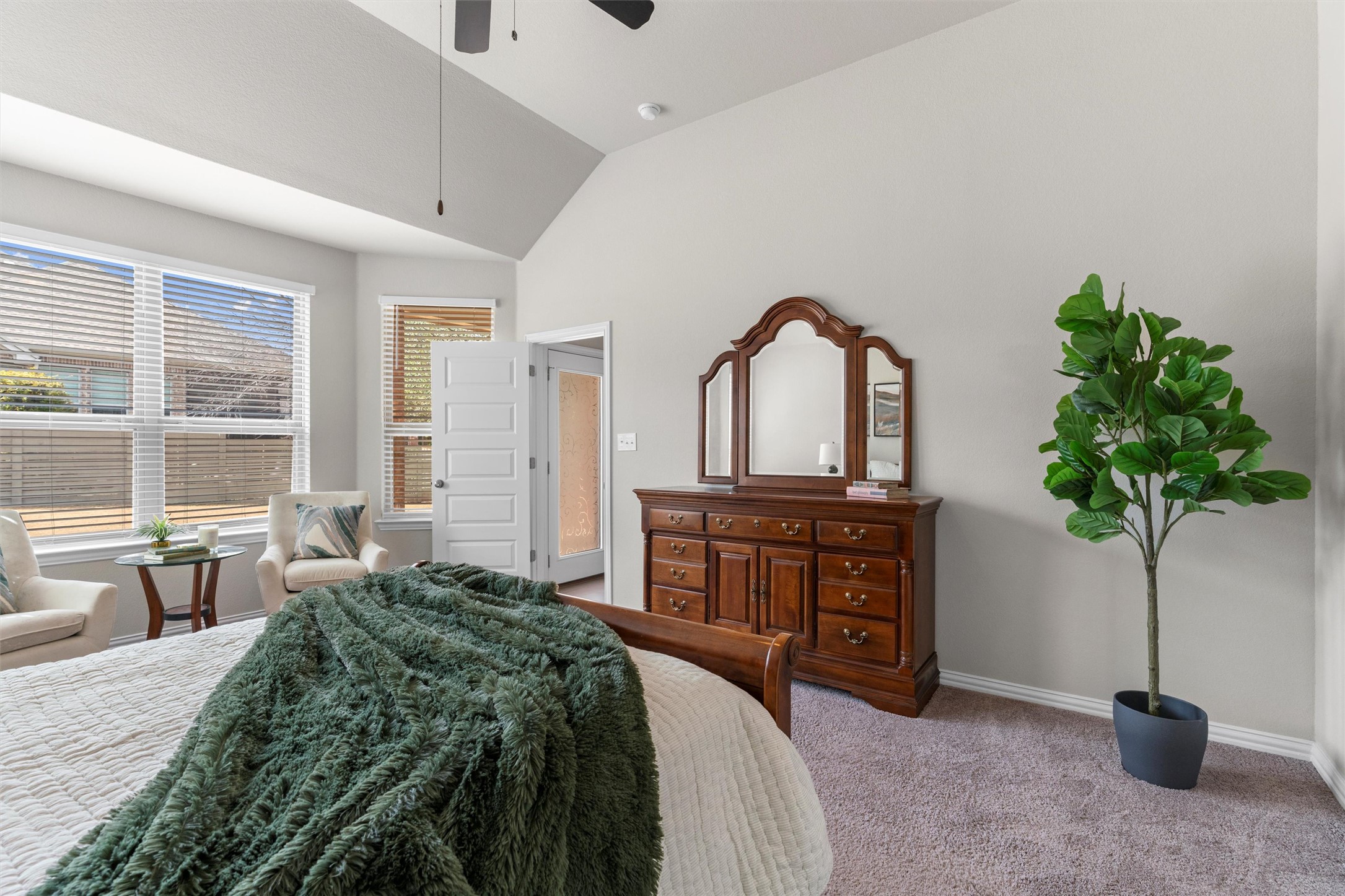 4216 Mercer Road Georgetown, TX 78628 - Photo 14 of 40 Carpeted bedroom with vaulted ceiling and ceiling fan