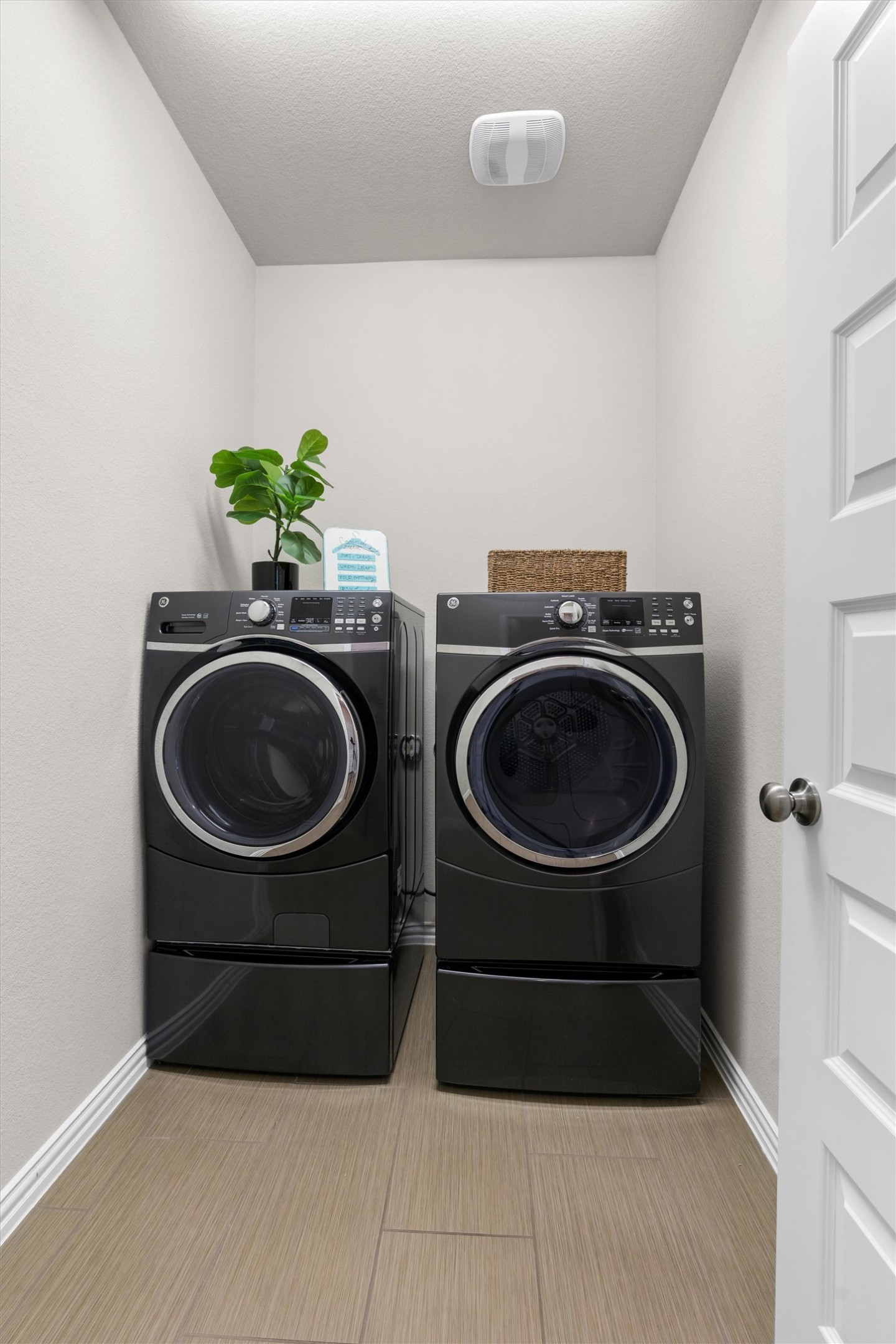 4216 Mercer Road Georgetown, TX 78628 - Photo 18 of 40 Laundry room with washer and dryer and baseboards