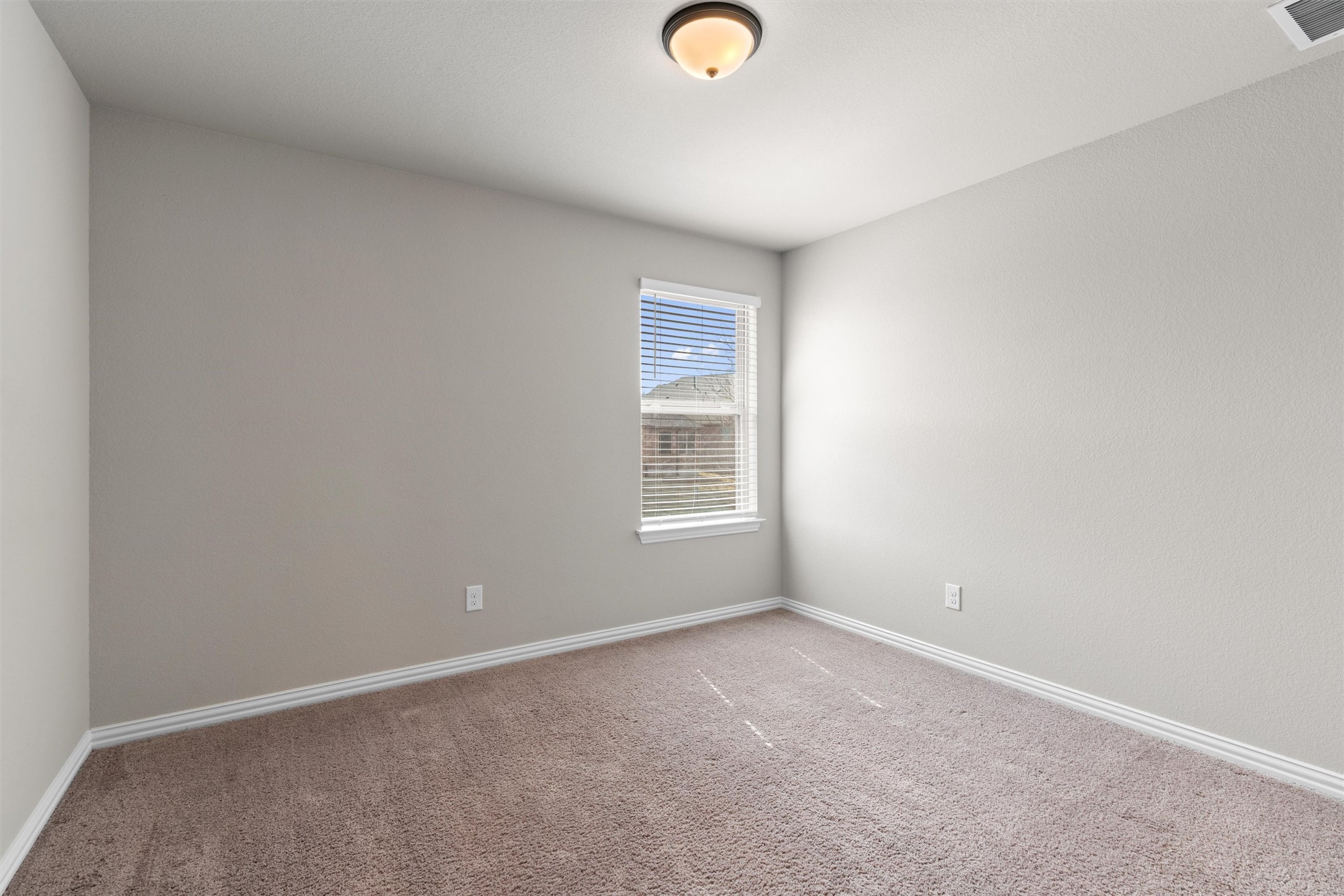 4216 Mercer Road Georgetown, TX 78628 - Photo 24 of 40 Carpeted room featuring baseboards