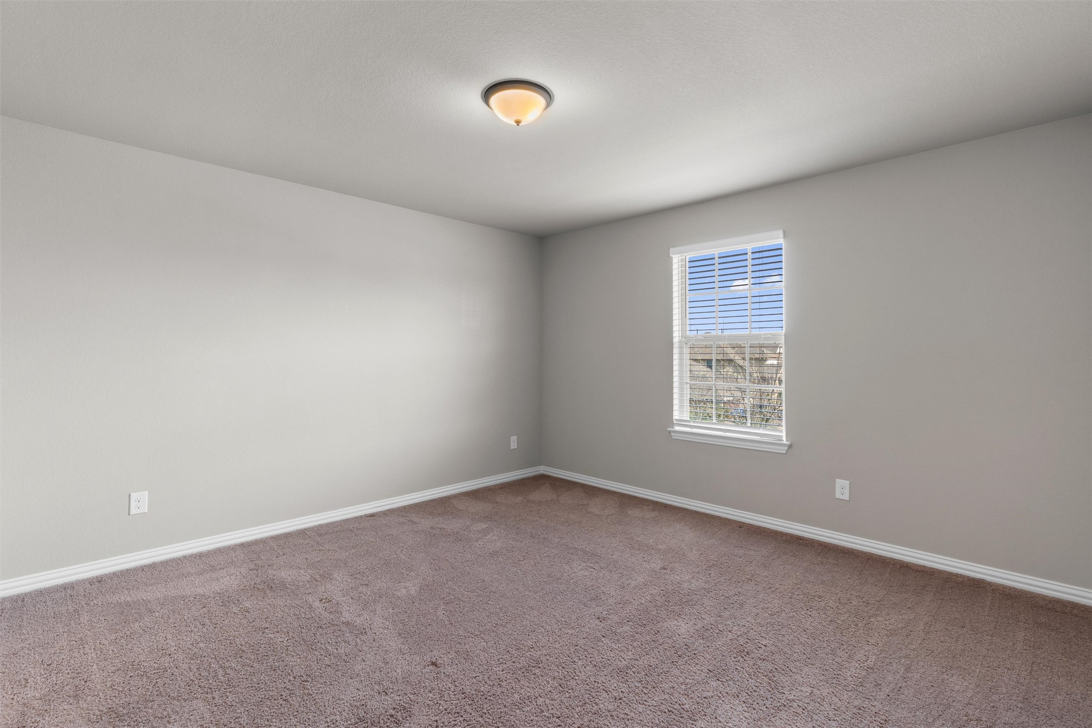 4216 Mercer Road Georgetown, TX 78628 - Photo 26 of 40 Carpeted bedroom with attached full bathroom and walk in closet.