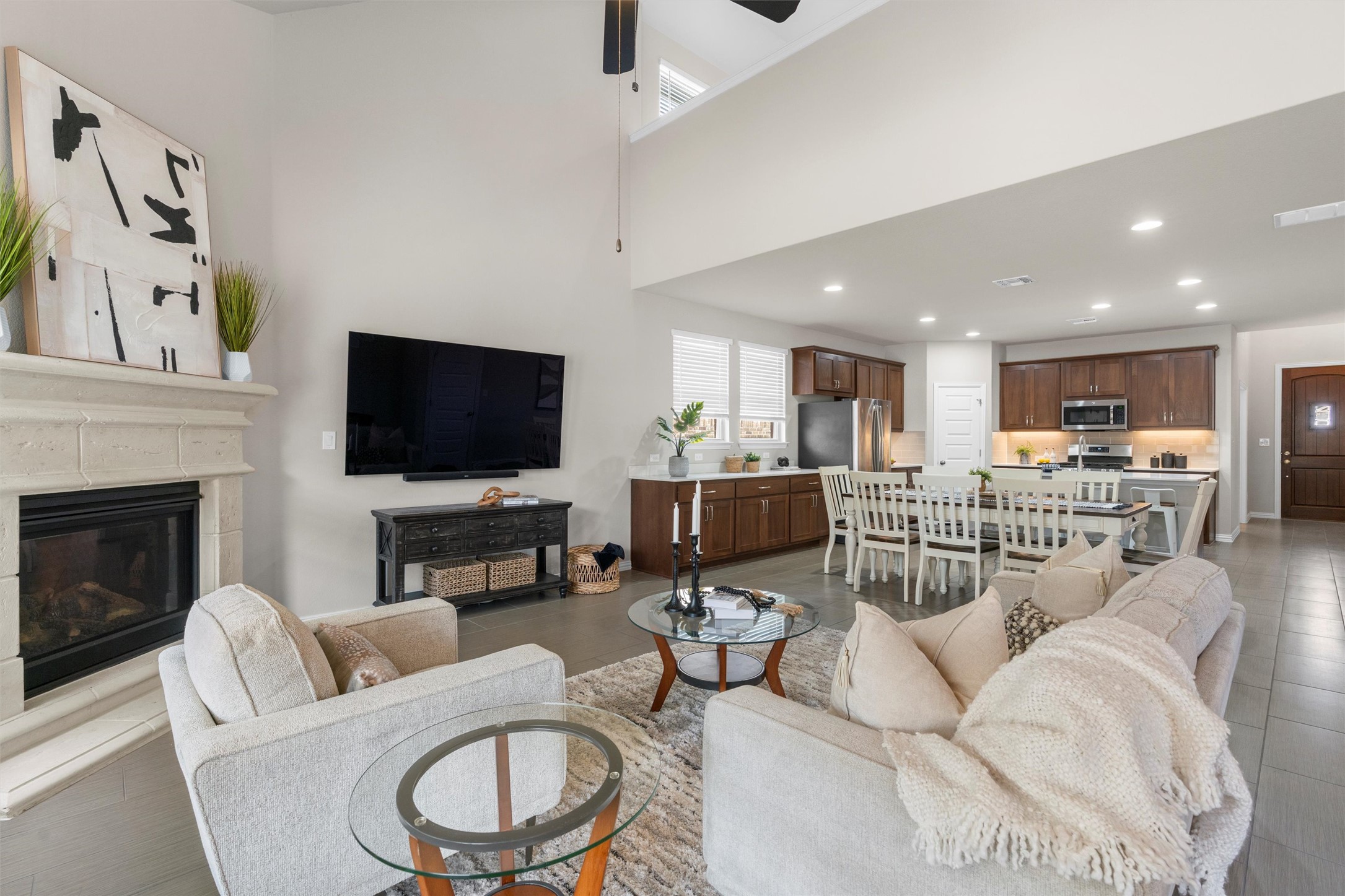 4216 Mercer Road Georgetown, TX 78628 - Photo 6 of 40 Living room featuring seamless flow from the kitchen, dining and living areas creates an inviting space perfect for gatherings and family meals.