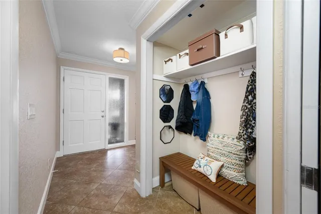 a view of an entryway with wooden floor
