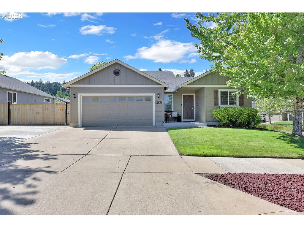 87836 8th Street Veneta, OR 97487 - Photo 1 of 25 a view of a house with a yard and potted plants