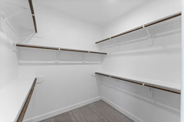 a view of an empty walk in closet