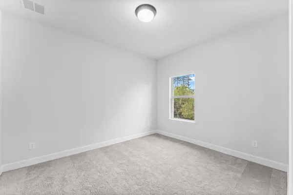 an empty room with a window