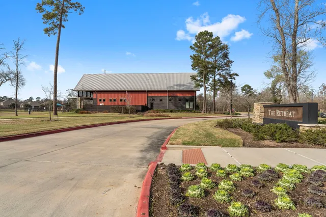 a view of a street with a building in the background