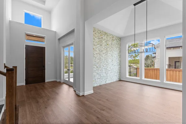 a view of livingroom with furniture wooden floor and window