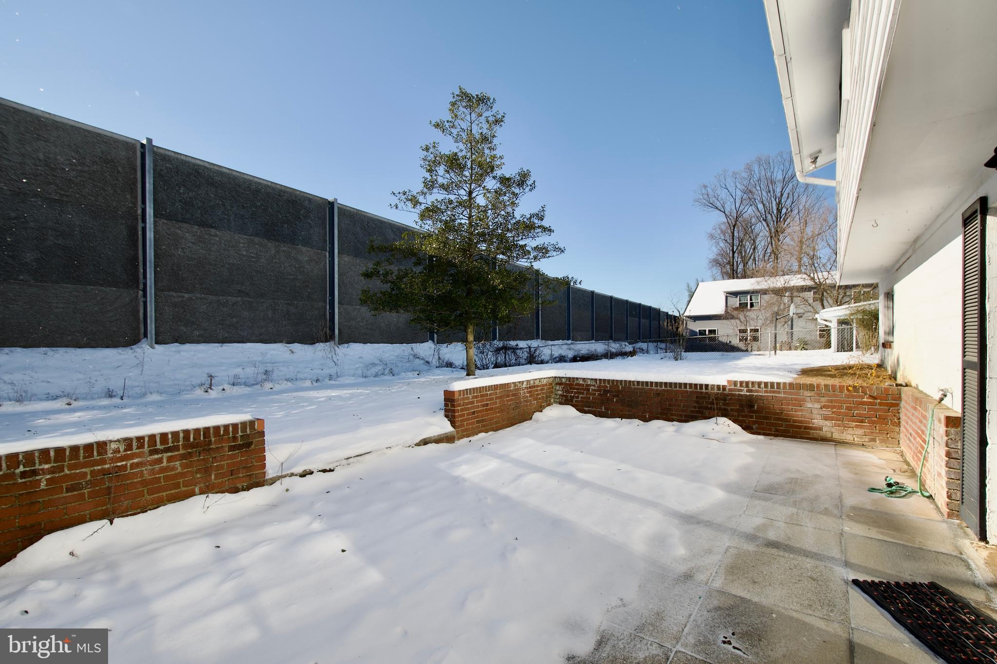 8319 Carnegie Drive Vienna, VA 22180 - Photo 53 of 56 Patio (under the snow)
