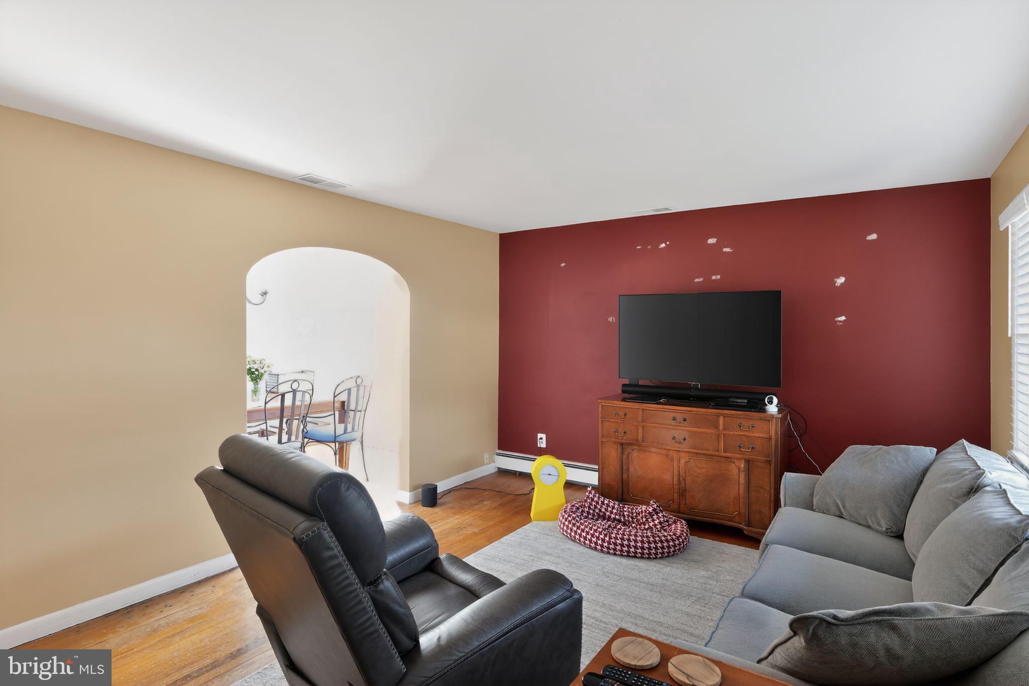 10386 Gorman Road Laurel, MD 20723 - Photo 10 of 30 Cozy living space with vibrant accents.