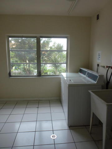 55 Southwest 2nd Avenue, Unit 402 Boca Raton, FL 33432 - Photo 7 of 8 bcp 402 Laundry Room