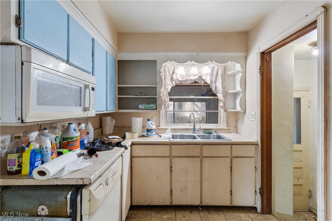 515 West Smith Road Medina, OH 44256 - Photo 8 of 25 Kitchen featuring white appliances and sink